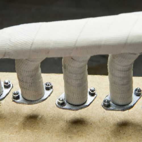 Collecteur d'échappement avec sa bande d'amiante et ses brides de fixation maquette Fiat 806