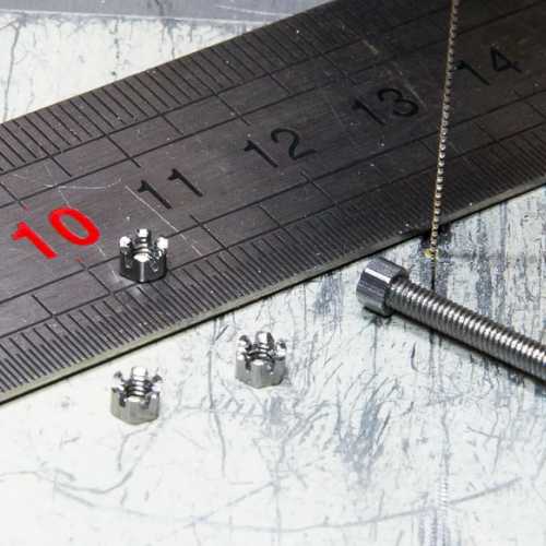 Transformation d'un écrou en écrou cannelé en utilsant ma scie à chantourner. GN JAP v8